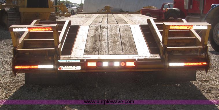 image for item F7138 2000 Dynaweld 951 30' triple axle equipment trailer