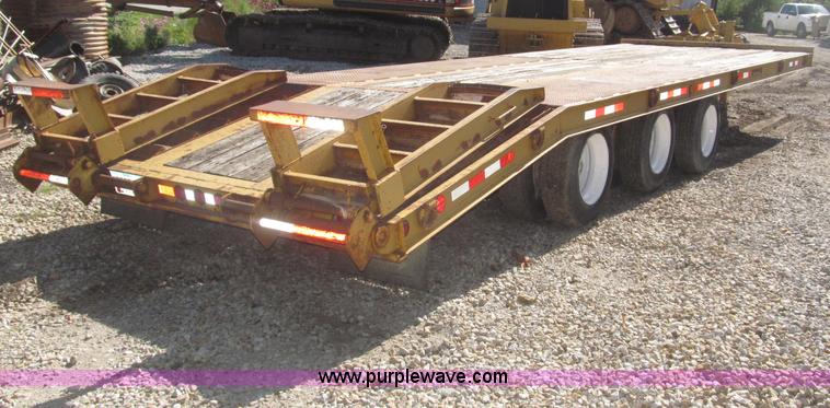 image for item F7138 2000 Dynaweld 951 30' triple axle equipment trailer