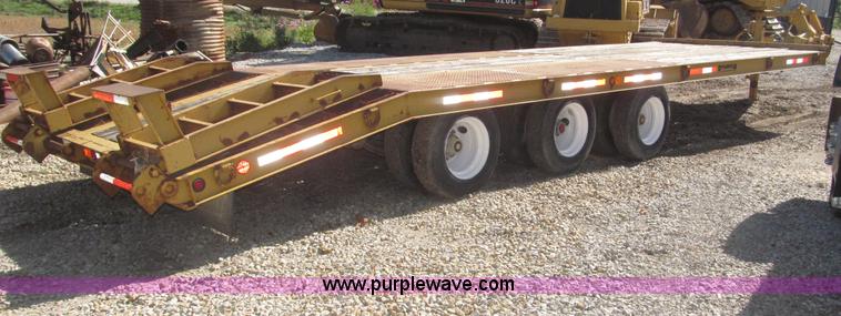 image for item F7138 2000 Dynaweld 951 30' triple axle equipment trailer