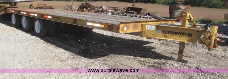 image for item F7138 2000 Dynaweld 951 30' triple axle equipment trailer