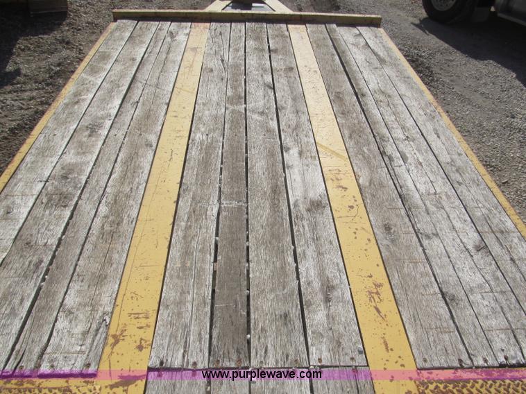 image for item F7138 2000 Dynaweld 951 30' triple axle equipment trailer