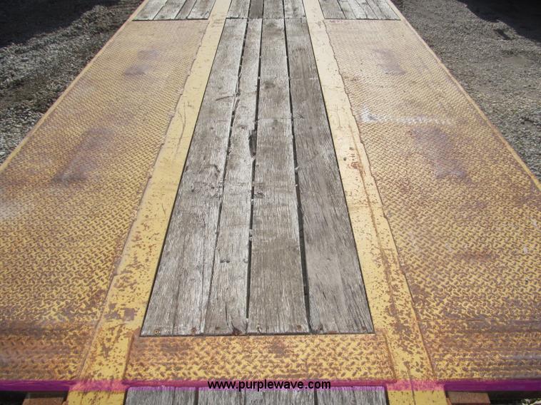 image for item F7138 2000 Dynaweld 951 30' triple axle equipment trailer