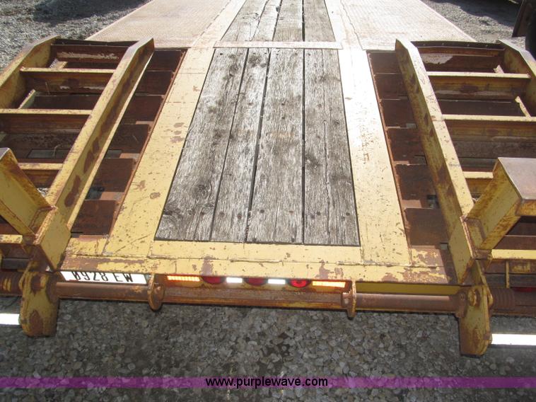 image for item F7138 2000 Dynaweld 951 30' triple axle equipment trailer