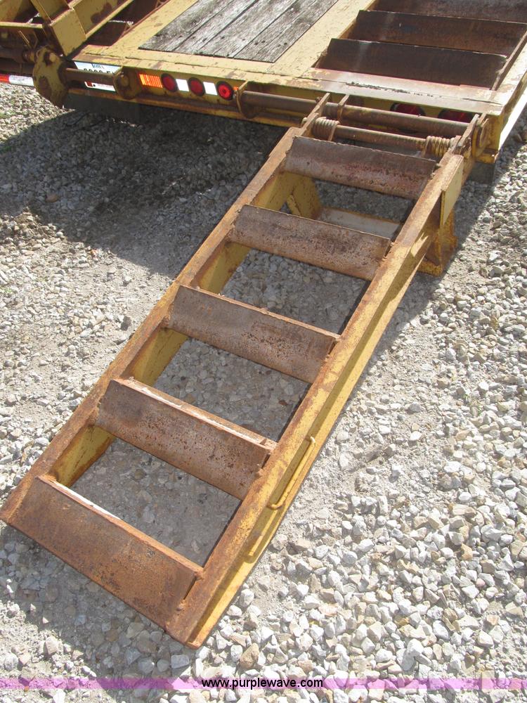 image for item F7138 2000 Dynaweld 951 30' triple axle equipment trailer