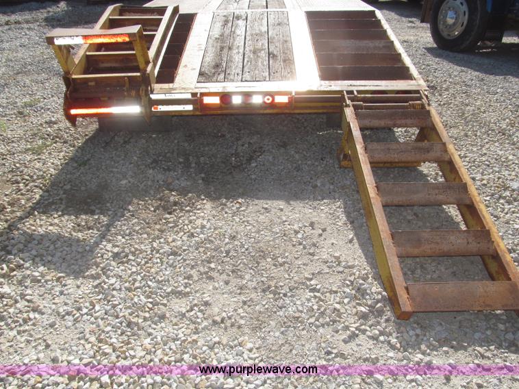image for item F7138 2000 Dynaweld 951 30' triple axle equipment trailer