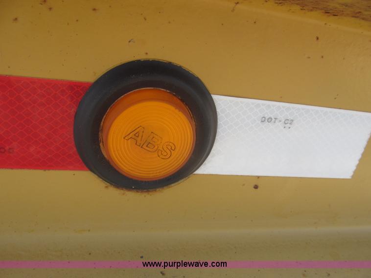 image for item F7138 2000 Dynaweld 951 30' triple axle equipment trailer