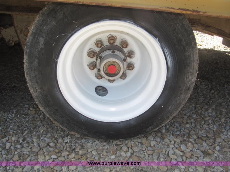 image for item F7138 2000 Dynaweld 951 30' triple axle equipment trailer