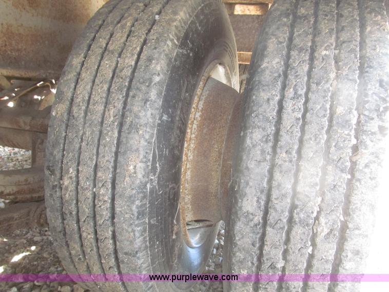 image for item F7138 2000 Dynaweld 951 30' triple axle equipment trailer