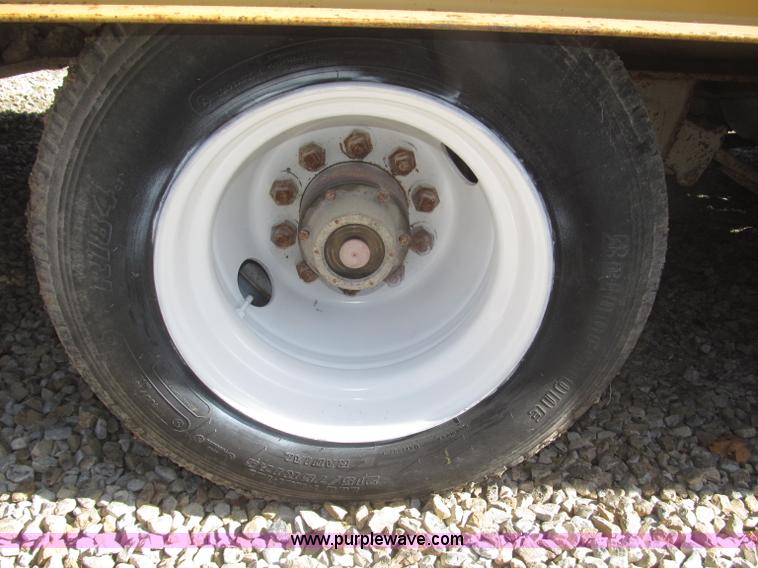 image for item F7138 2000 Dynaweld 951 30' triple axle equipment trailer