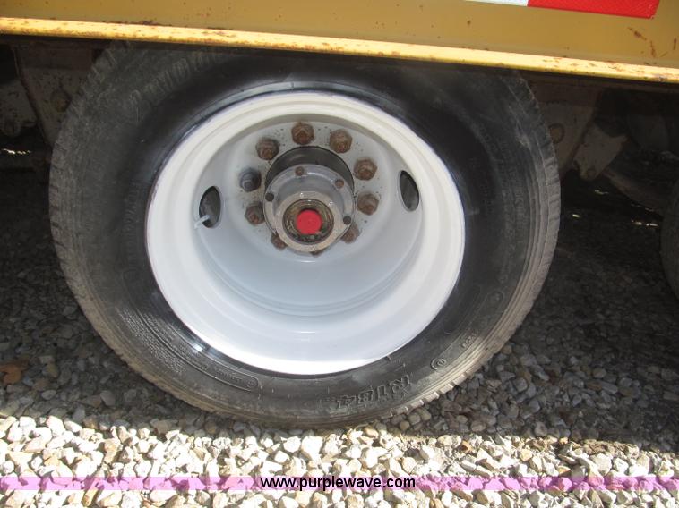 image for item F7138 2000 Dynaweld 951 30' triple axle equipment trailer
