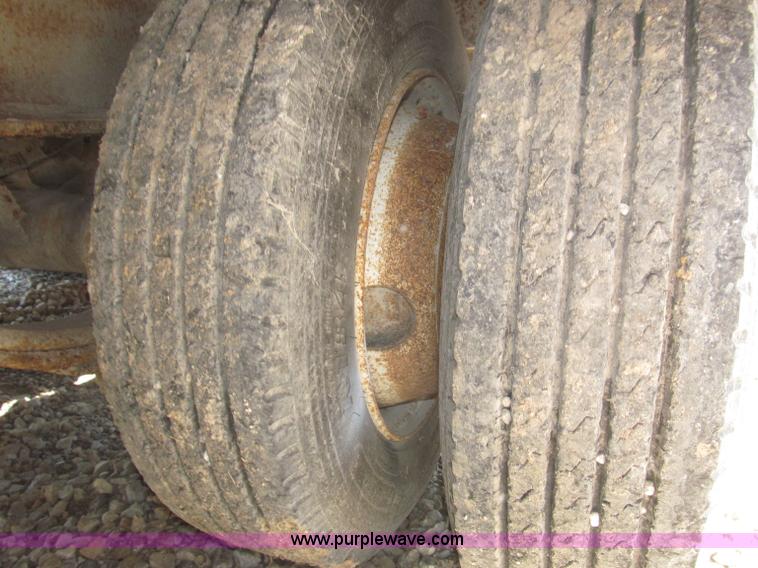 image for item F7138 2000 Dynaweld 951 30' triple axle equipment trailer