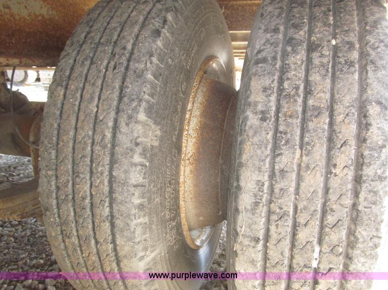 image for item F7138 2000 Dynaweld 951 30' triple axle equipment trailer