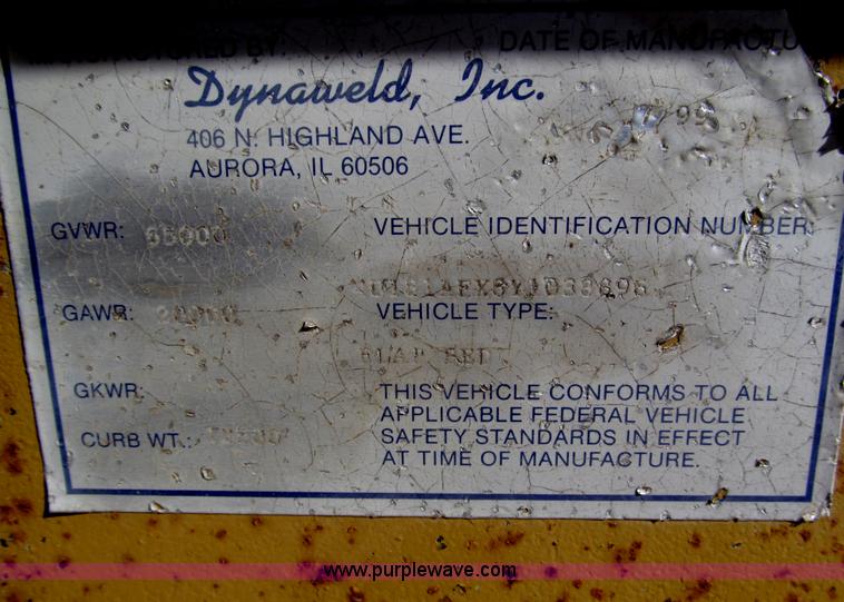 image for item F7138 2000 Dynaweld 951 30' triple axle equipment trailer