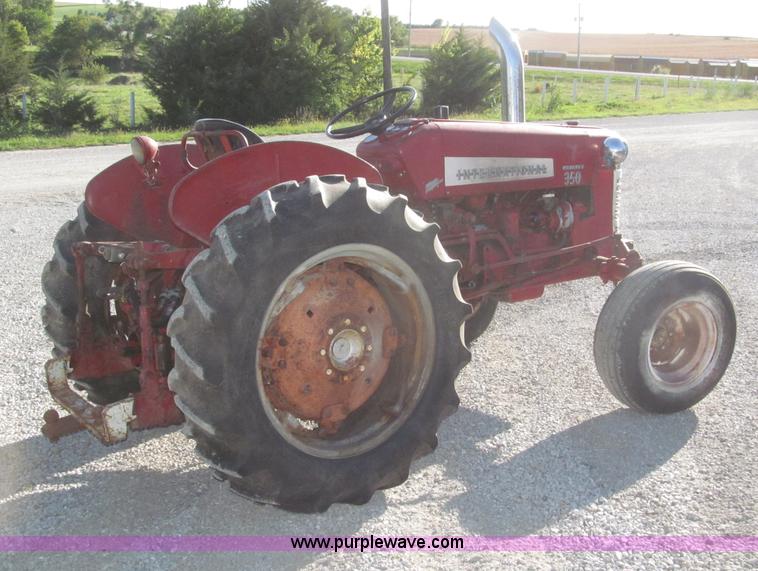 image for item F7140 1957 International 350 tractor