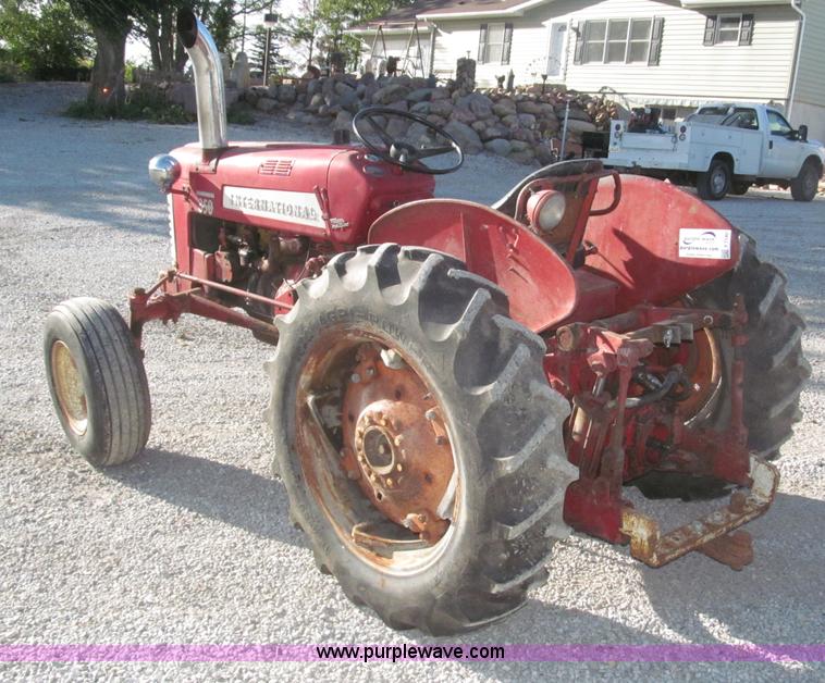 image for item F7140 1957 International 350 tractor
