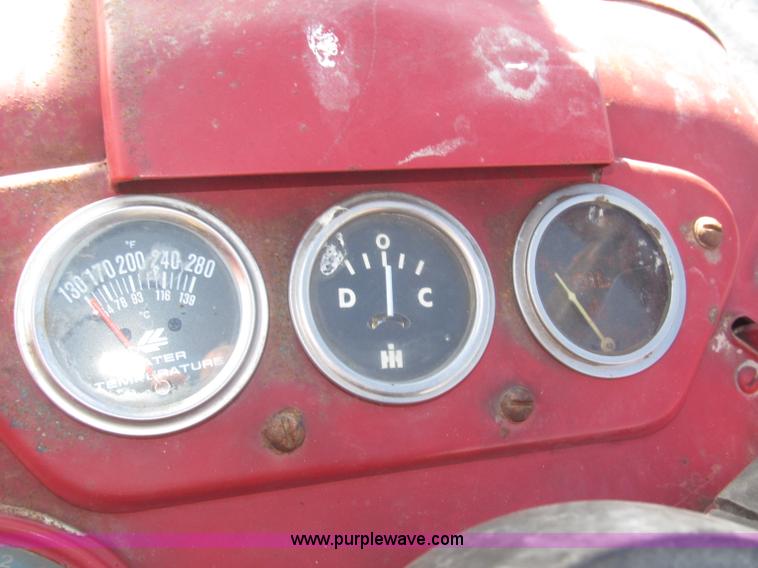 image for item F7140 1957 International 350 tractor