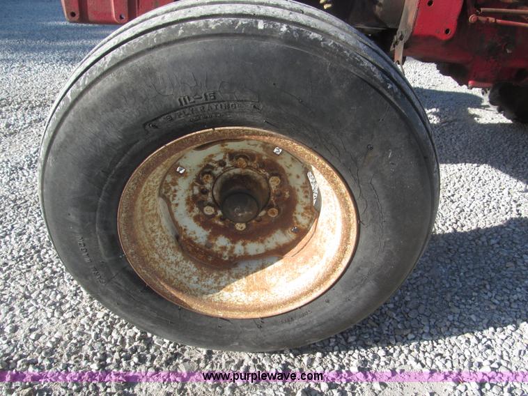 image for item F7140 1957 International 350 tractor