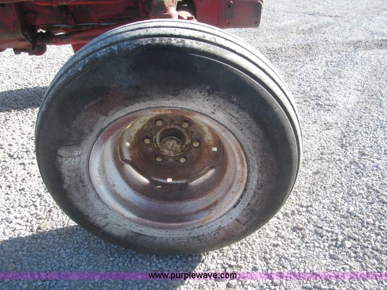 image for item F7140 1957 International 350 tractor