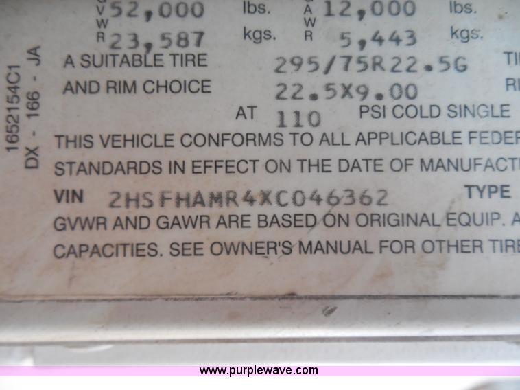 image for item I1496 1999 International 9400 semi truck