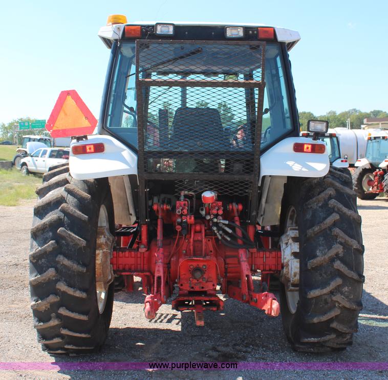 image for item H6908 1997 New Holland 7740SL MFWD tractor