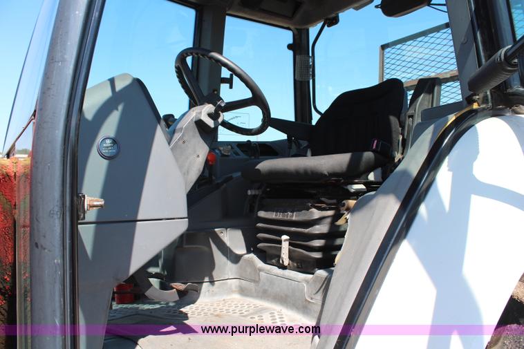 image for item H6908 1997 New Holland 7740SL MFWD tractor