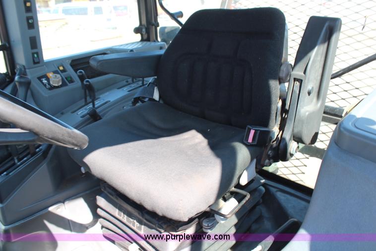 image for item H6908 1997 New Holland 7740SL MFWD tractor