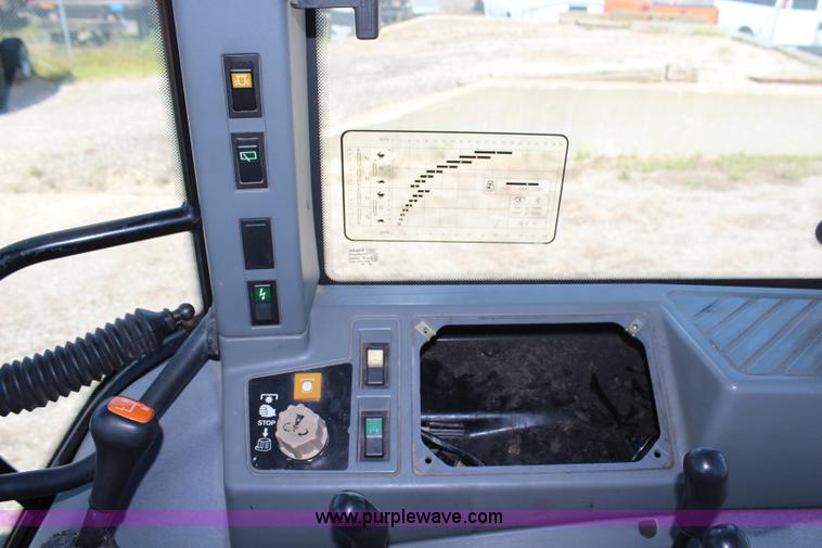 image for item H6908 1997 New Holland 7740SL MFWD tractor