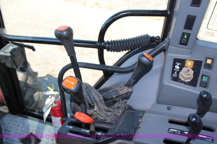 image for item H6908 1997 New Holland 7740SL MFWD tractor