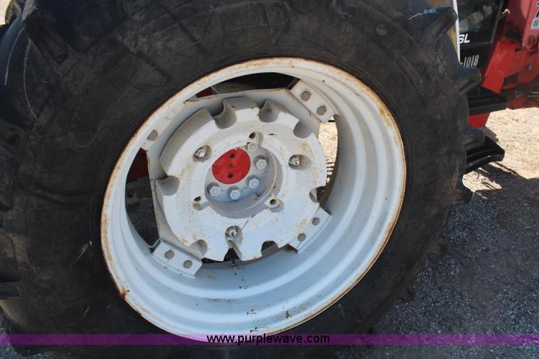 image for item H6908 1997 New Holland 7740SL MFWD tractor