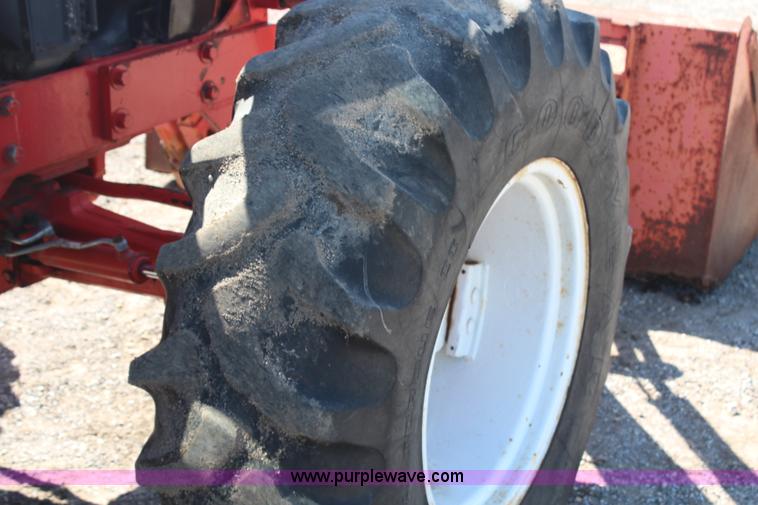 image for item H6908 1997 New Holland 7740SL MFWD tractor