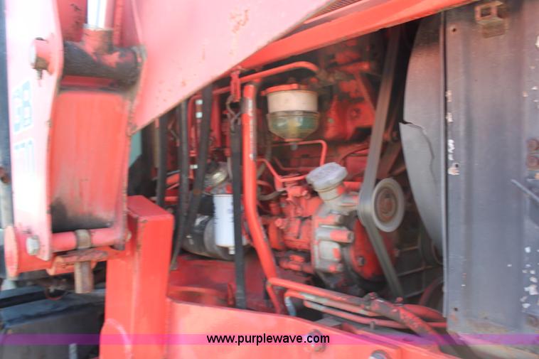 image for item H6908 1997 New Holland 7740SL MFWD tractor