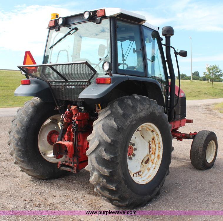 image for item H6909 1999 Ford New Holland TS100 tractor