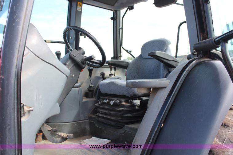 image for item H6909 1999 Ford New Holland TS100 tractor