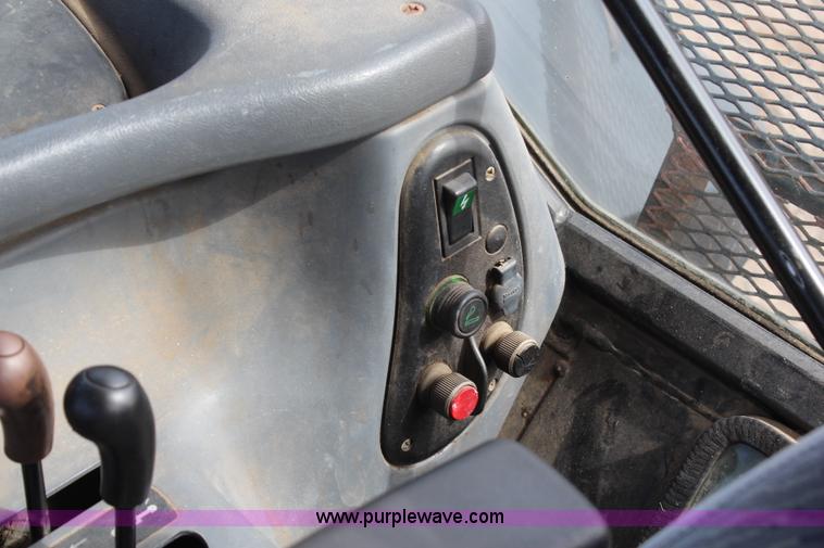 image for item H6909 1999 Ford New Holland TS100 tractor