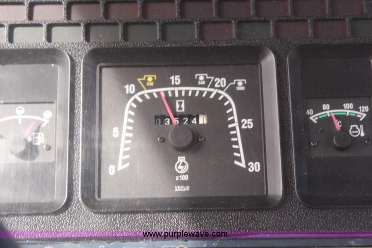 image for item H6909 1999 Ford New Holland TS100 tractor