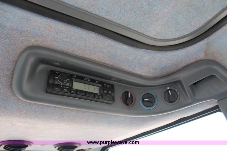 image for item H6909 1999 Ford New Holland TS100 tractor