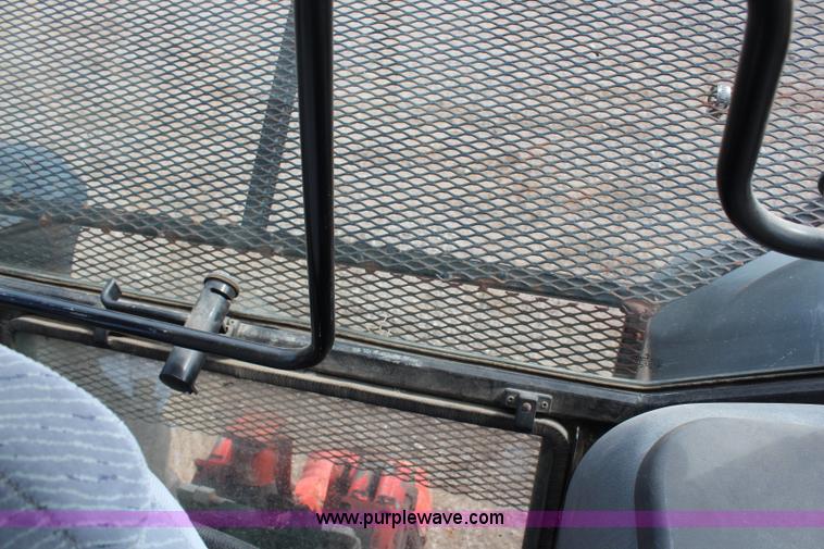 image for item H6909 1999 Ford New Holland TS100 tractor