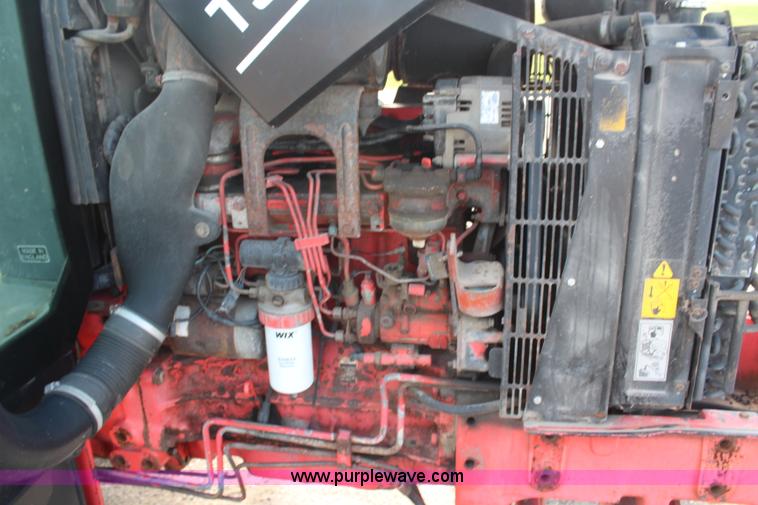 image for item H6909 1999 Ford New Holland TS100 tractor