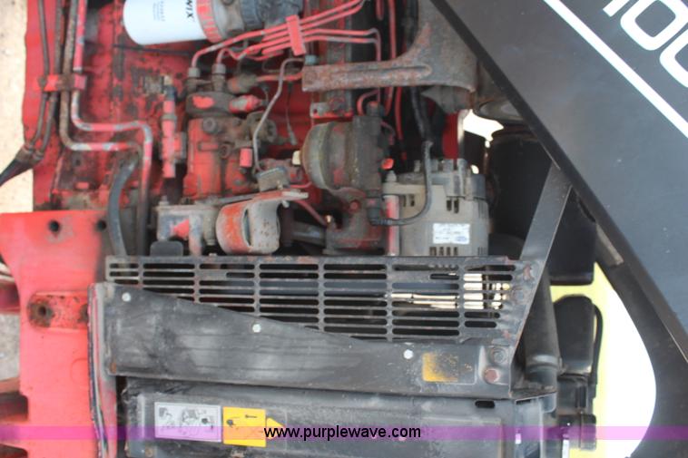 image for item H6909 1999 Ford New Holland TS100 tractor