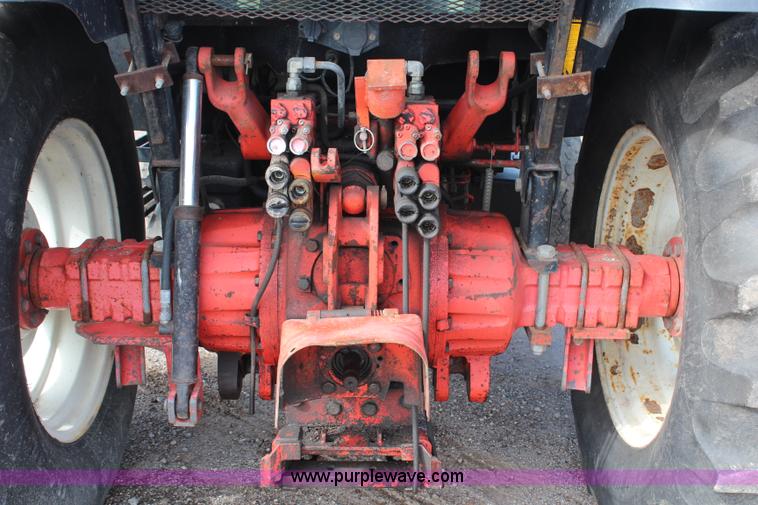 image for item H6909 1999 Ford New Holland TS100 tractor