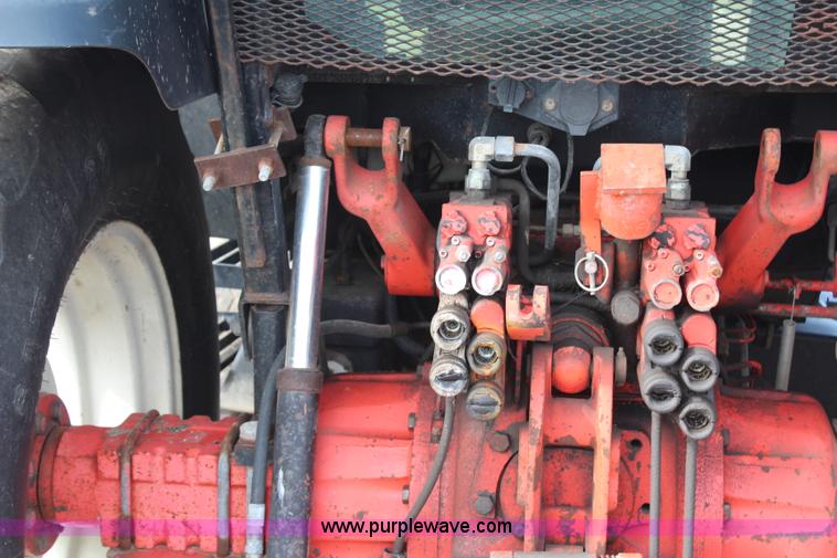 image for item H6909 1999 Ford New Holland TS100 tractor