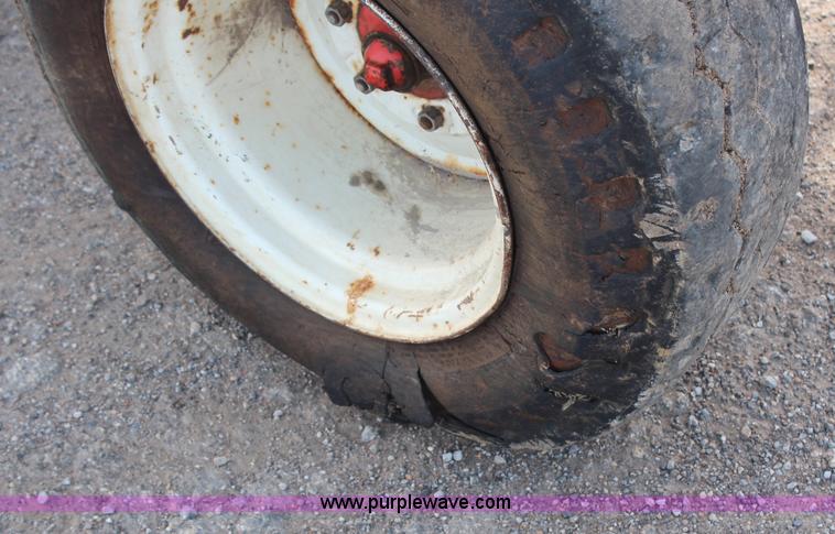 image for item H6909 1999 Ford New Holland TS100 tractor