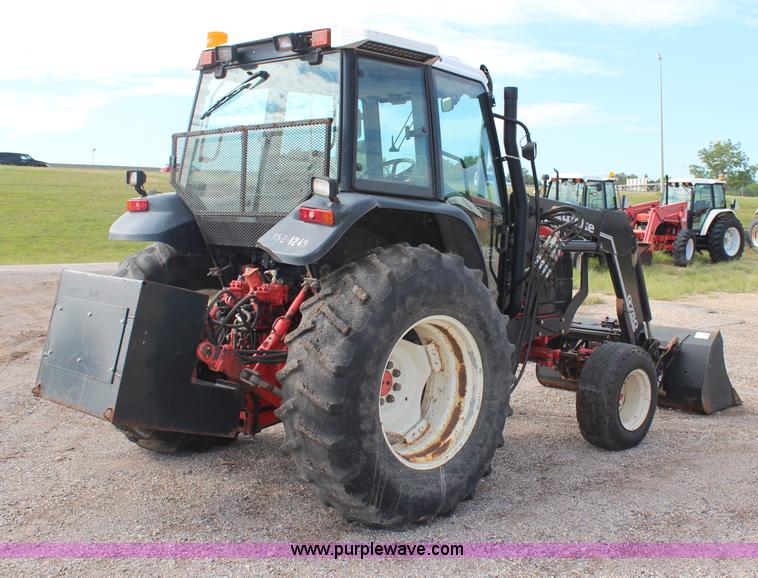 image for item H6910 1999 Ford New Holland TS100 tractor