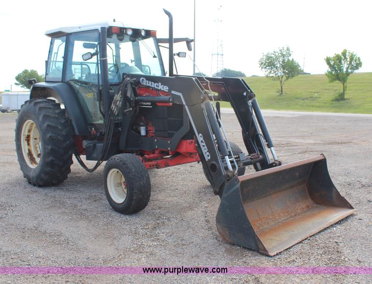 image for item H6910 1999 Ford New Holland TS100 tractor