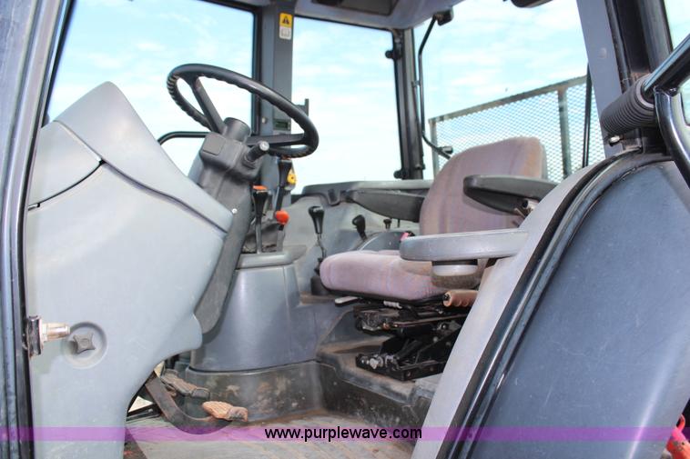 image for item H6910 1999 Ford New Holland TS100 tractor