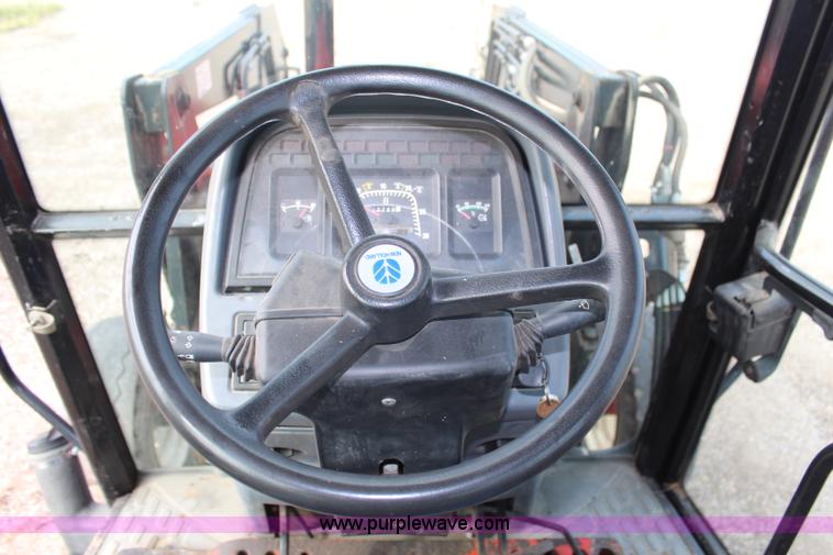 image for item H6910 1999 Ford New Holland TS100 tractor
