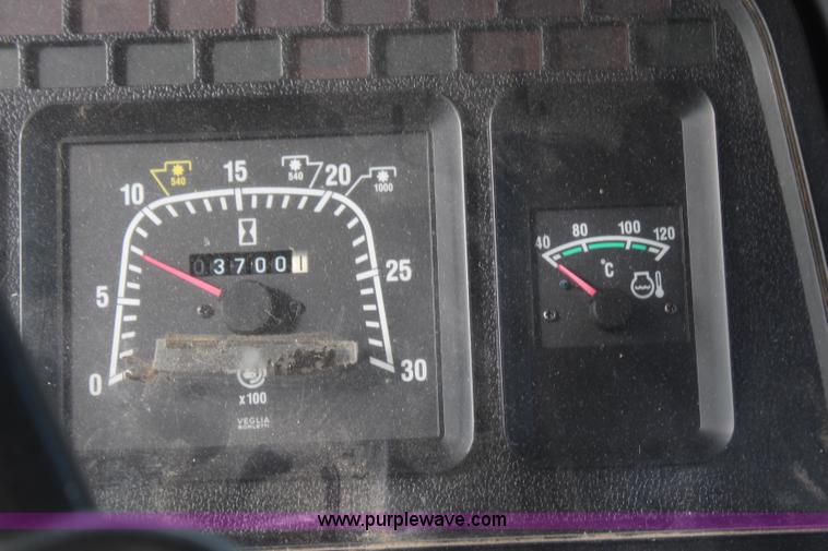 image for item H6910 1999 Ford New Holland TS100 tractor