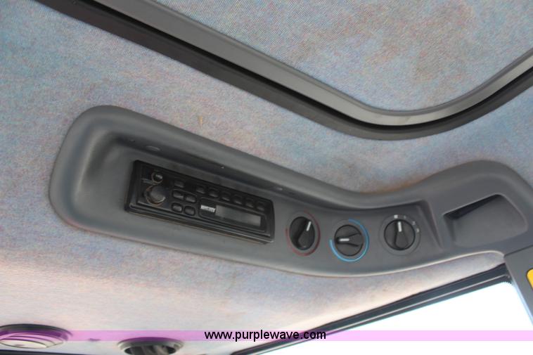 image for item H6910 1999 Ford New Holland TS100 tractor