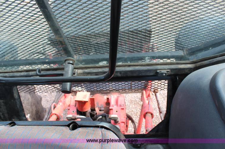 image for item H6910 1999 Ford New Holland TS100 tractor