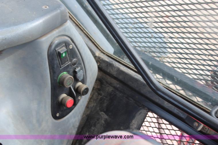 image for item H6910 1999 Ford New Holland TS100 tractor